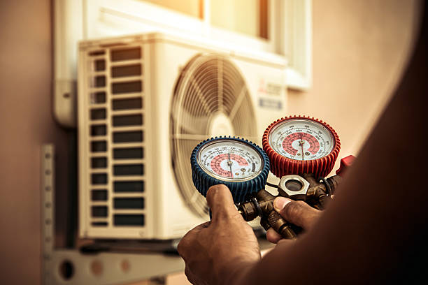 Professional Air Conditioning Service technician working in Garland, NC